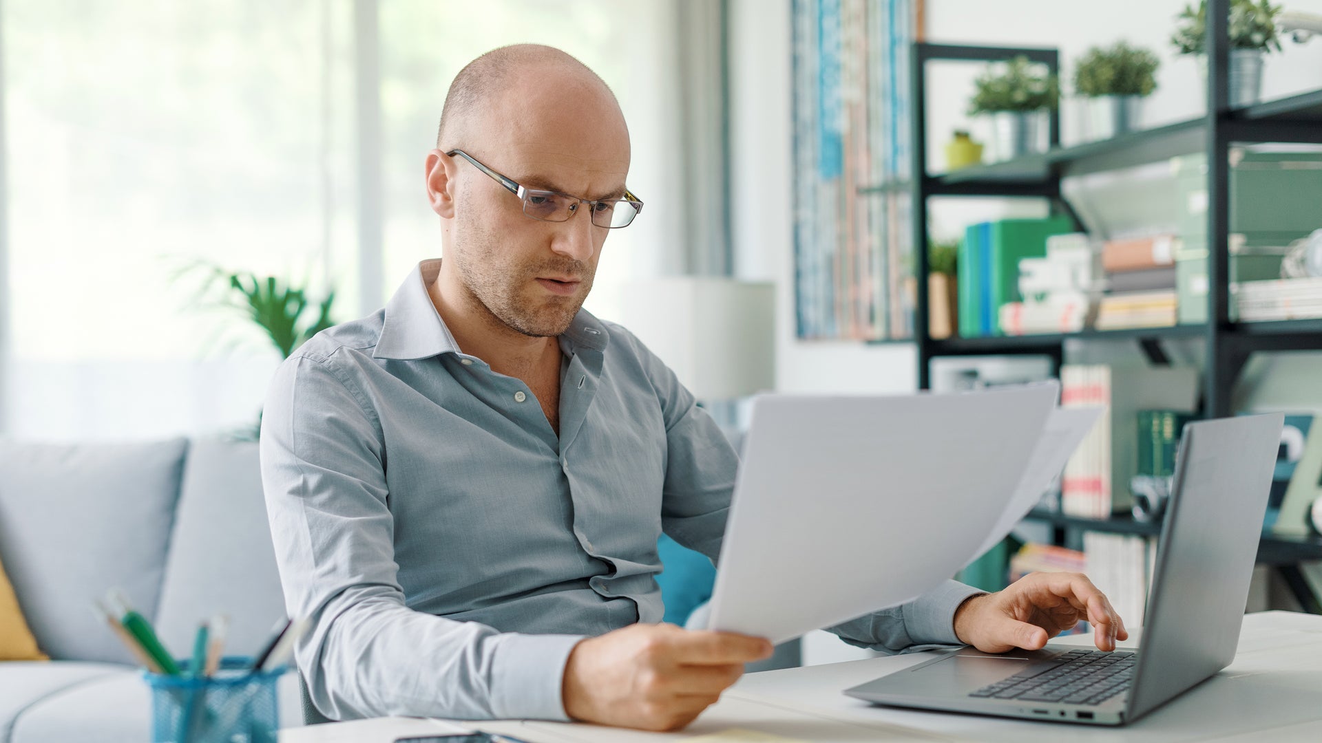Person reviewing legal documents and court records related to a U.S. citizenship application
