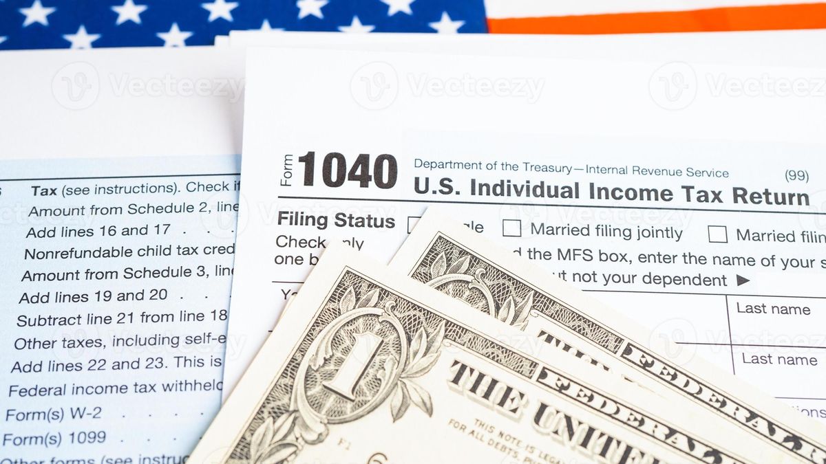 IRS tax form 1040 with American flag representing tax compliance for citizenship